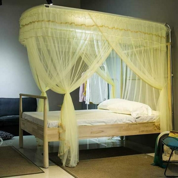 Elegant Yellow Four-Poster Bed Canopy
